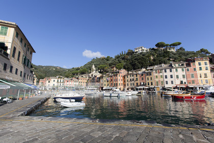 .Portofino,  the pretty port  in Italian is located in the hollow of a cove on the Ligurian coast. This small fishing port became one of the most exclusive resorts in Italy , however, has not lost its charm ..Photo © Jean -Marie Liot