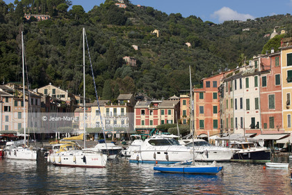 .Portofino,  the pretty port  in Italian is located in the hollow of a cove on the Ligurian coast. This small fishing port became one of the most exclusive resorts in Italy , however, has not lost its charm ..Photo © Jean -Marie Liot