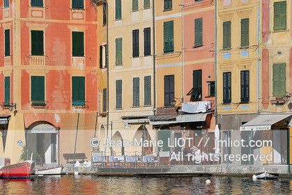 .Portofino,  the pretty port  in Italian is located in the hollow of a cove on the Ligurian coast. This small fishing port became one of the most exclusive resorts in Italy , however, has not lost its charm ..Photo © Jean -Marie Liot