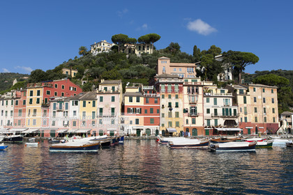 .Portofino,  the pretty port  in Italian is located in the hollow of a cove on the Ligurian coast. This small fishing port became one of the most exclusive resorts in Italy , however, has not lost its charm ..Photo © Jean -Marie Liot