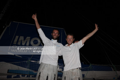 .Arrival in Imoca Banque Populaire Costa Rica on November 19, 2011. Skippers Armel Le Cleac'h and Christopher Pratt placed third in the Imocas category. Photo © Jean-marie Liot   DPPI