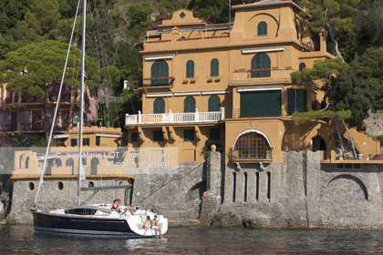 .Portofino,  the pretty port  in Italian is located in the hollow of a cove on the Ligurian coast. This small fishing port became one of the most exclusive resorts in Italy , however, has not lost its charm ..Photo © Jean -Marie Liot