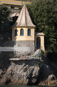 .Portofino,  the pretty port  in Italian is located in the hollow of a cove on the Ligurian coast. This small fishing port became one of the most exclusive resorts in Italy , however, has not lost its charm ..Photo © Jean -Marie Liot