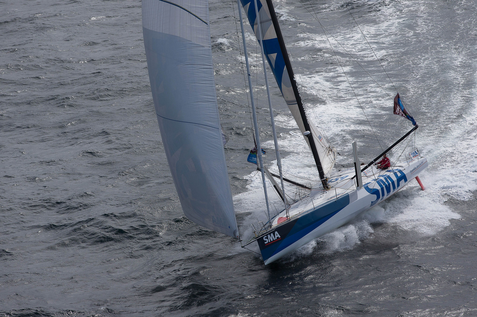 Paul Meilhat et Michel Desjoyeaux à l'entrainement sur IMOCA SMA avant le départ de la Transat Jacques vabre 2015 au départ du Havre et à destination de Itajaï au Brésil..Groix, 16 09 2015, Photo © Jean-Marie LIOT   DPPI.